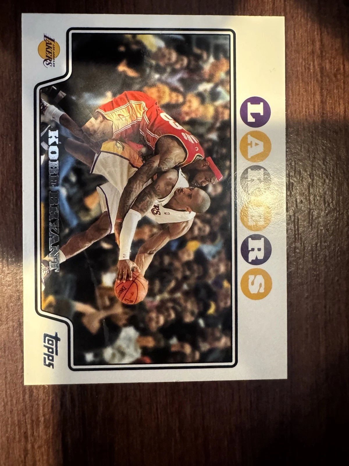 Independent seller reference photo of the white-border 2008 Topps Kobe Bryant number 24, with LeBron James defending. Different physical copy from the submitted card.