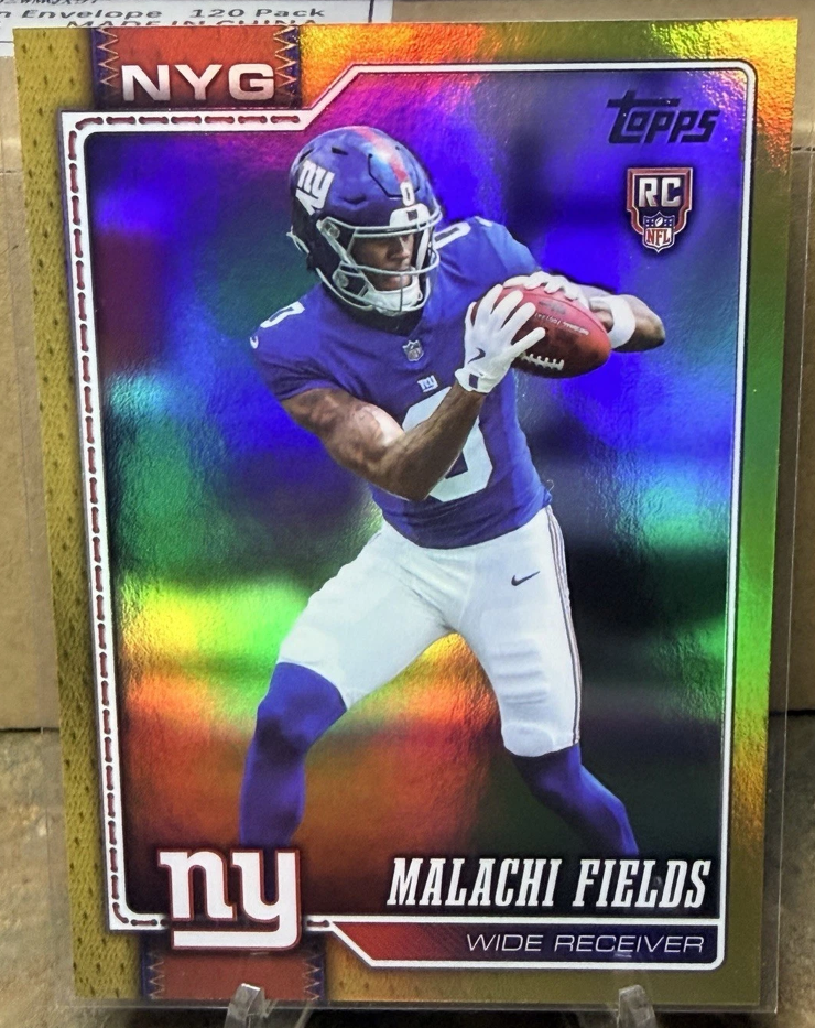 Independent seller photo of Malachi Fields 2026 Topps rookie #330 Gold, with reverse photo confirming 18/50. Reference printing differs from the requested Orange 08/25 card.