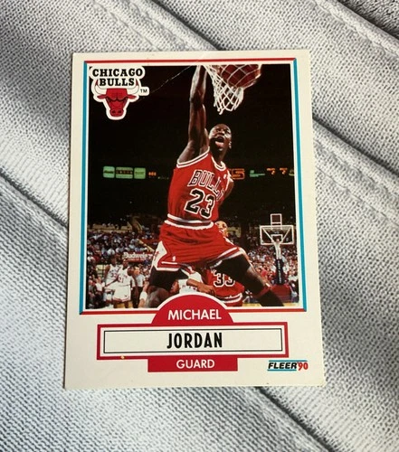 Actual independent photograph of Michael Jordan 1990–91 Fleer #26 in a red Bulls uniform, a raw copy with the no-line reverse. This is not the submitted card.