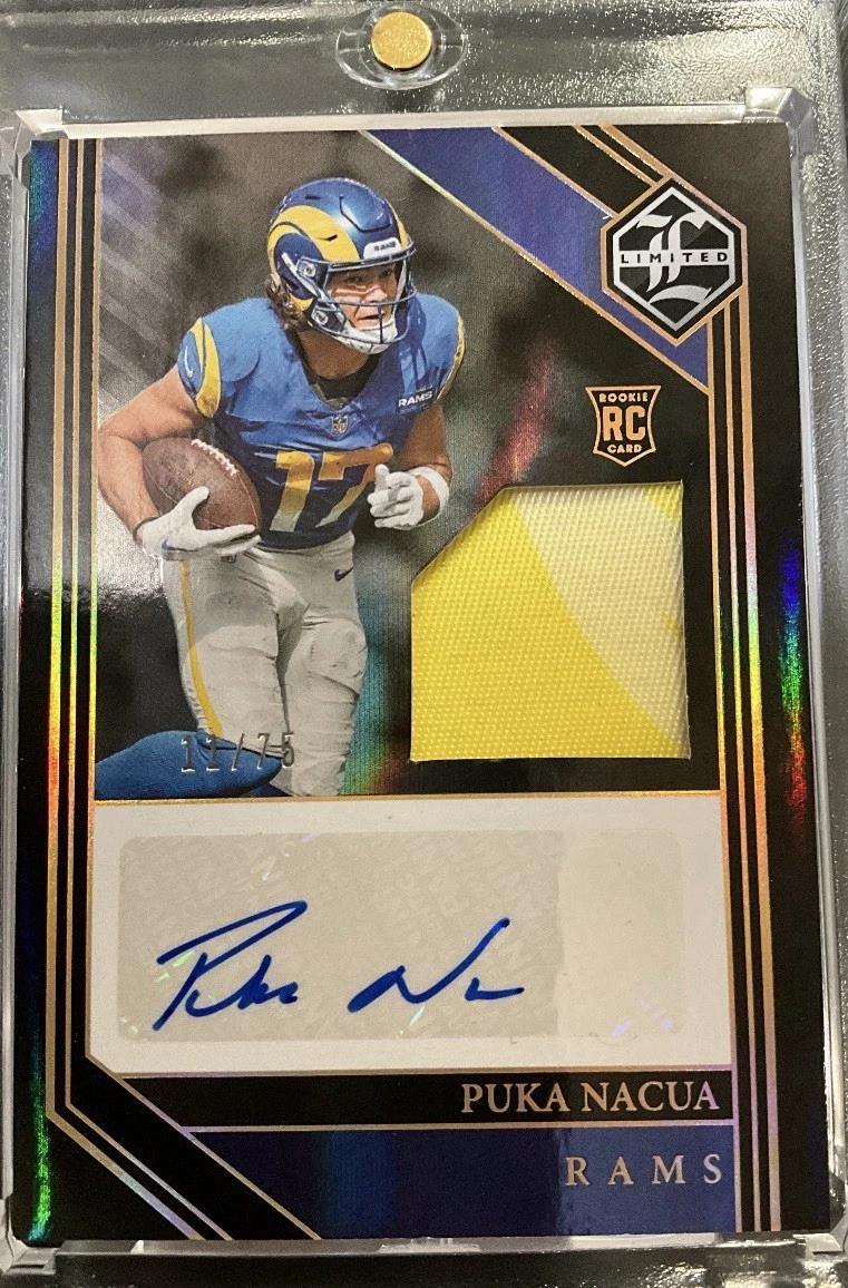 Puka Nacua 2023 Limited Gold Spotlight rookie patch autograph #128, independent copy 11/75 with a single yellow patch.